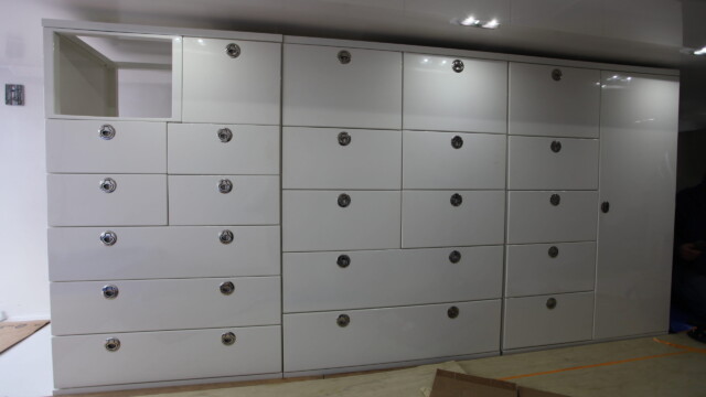 Bank of custom drawers positioned 4